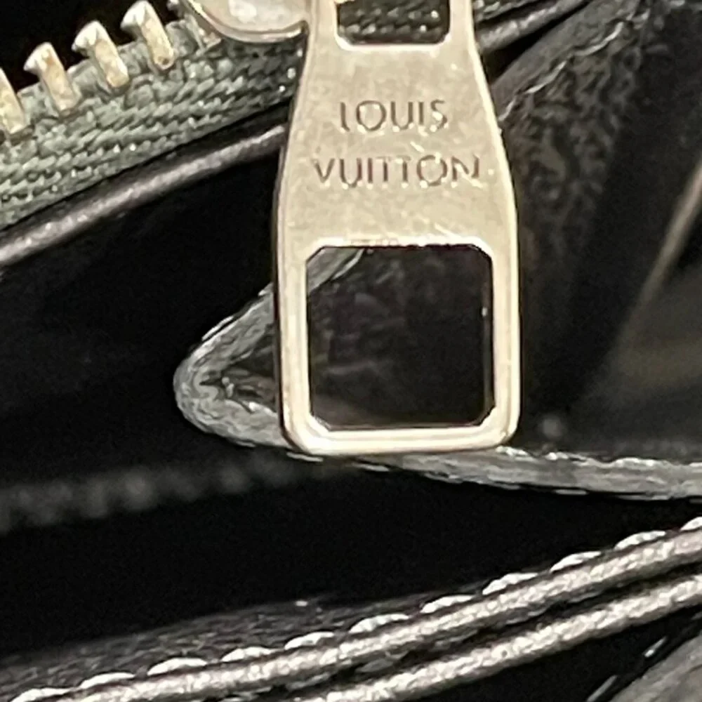 Louis Vuitton Zippy Wallet Monogram Empreinte Leather with Silver Studs (JB1040)
